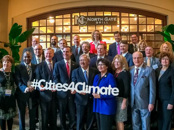 美国180个关注气候变化的城市市长承诺180坚持实行《巴黎气候协议》——关注气候变化的美国城市市长的公开信